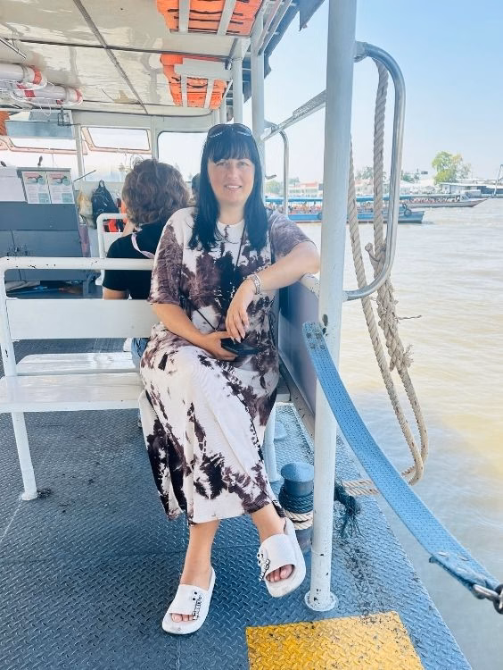 C2C crochet designer Ariana Wimsett travelling on a ferry in Bangkok. 