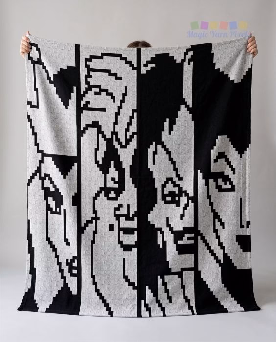 A person holding up a large, black and white C2C crochet blanket featuring pixelated designs of four villains: the Evil Queen, Ursula, Cruella de Vil, and Maleficent. The Magic Yarn Pixels logo is watermarked in the top right corner. This is part of a crochet roundup from https://magicyarnpixels.com/.