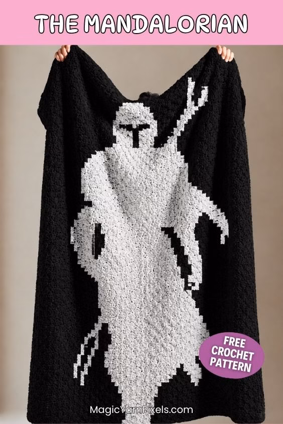 A black and white C2C crochet blanket featuring a pixel art silhouette of The Mandalorian being held up vertically. The image includes text overlays for a free pattern at MagicYarnPixels.com. Original design by Ariana of MagicYarnPixels.