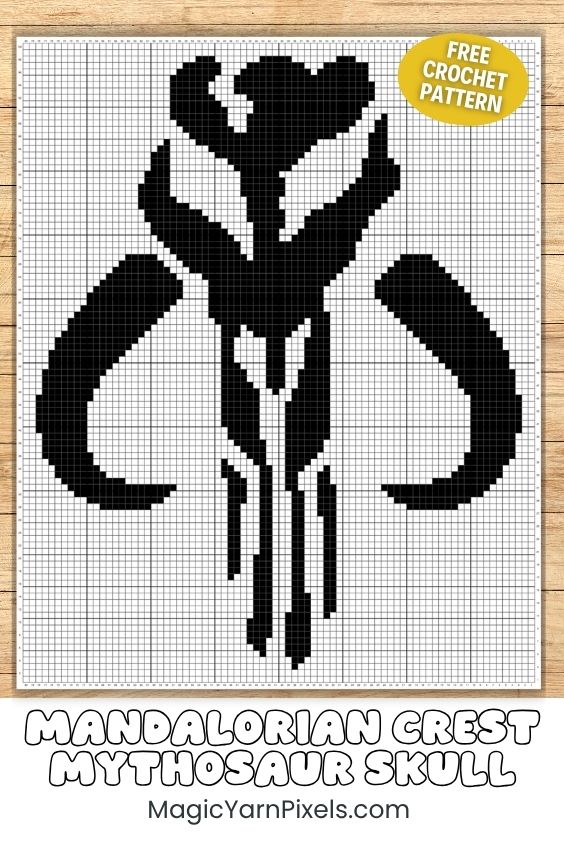 A black and white pixel graph grid showing the detailed chart for a Mandalorian crest Mythosaur skull crochet pattern. The grid is displayed against a light wood background. Text at the bottom reads "MANDALORIAN CREST MYTHOSAUR SKULL MagicYarnPixels.com" with a yellow circle sticker graphic in the corner reading "FREE CROCHET PATTERN". Original design by Ariana of MagicYarnPixels.