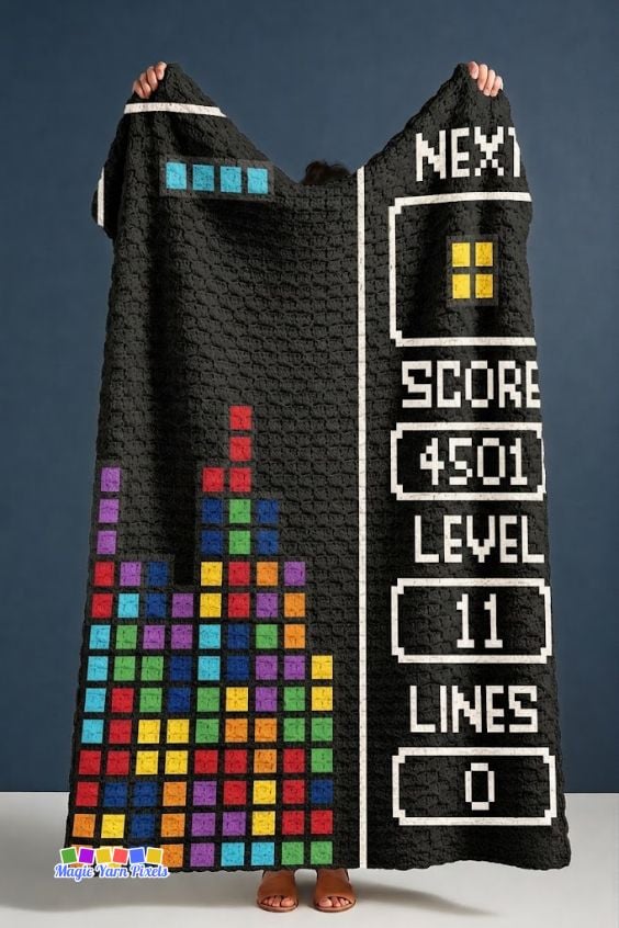 Large Retro Arcade Blocks C2C crochet blanket held open to show the full retro game-inspired design with colorful pixel blocks and scoreboard. Original design by Ariana of MagicYarnPixels.