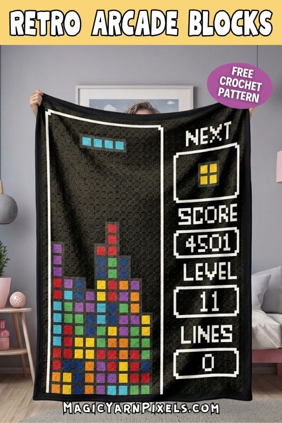 Person holding the Retro Arcade Blocks C2C crochet blanket featuring colorful pixel blocks and a retro arcade-inspired game display. Free crochet pattern by MagicYarnPixels. Original design by Ariana of MagicYarnPixels.