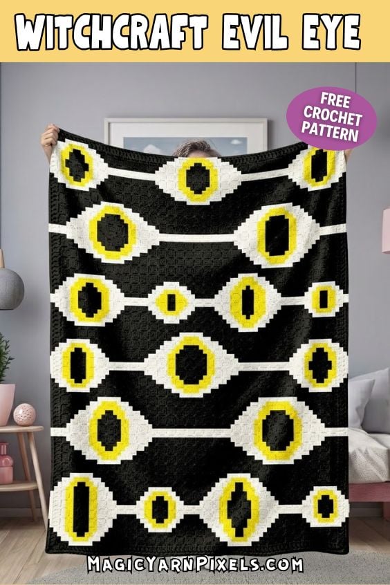 Finished Witchcraft Evil Eye C2C crochet blanket held up to display the repeating evil eye design in black, white, and yellow. Free evil eye crochet pattern. Original design by Ariana of MagicYarnPixels.